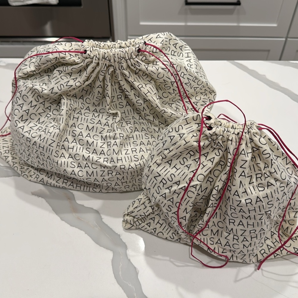 Two dust Isaac Mizrahi storage bags